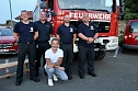 Bad Langensalzaer B&uuml;rgermeister (Mitte) mit Kameraden der Berufsfeuerwehr beim "ABBA Dream Tribune" Konzert auf dem Jahnplatz in Bad Langensalza (Foto: Eva Maria Wiegand)