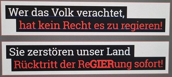 Von den Spazierg&auml;ngern in M&uuml;hlhausen mitgef&uuml;hrte Plakate (Foto: H.Kuhnert)