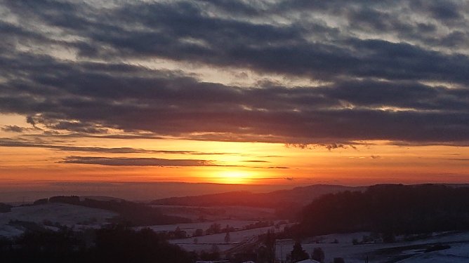 2. Sonnenuntergang - Ausblick von Osterode in Richtung Niedersachswerfen. Die Sonne geht unter (Foto: Christoph Burkert)